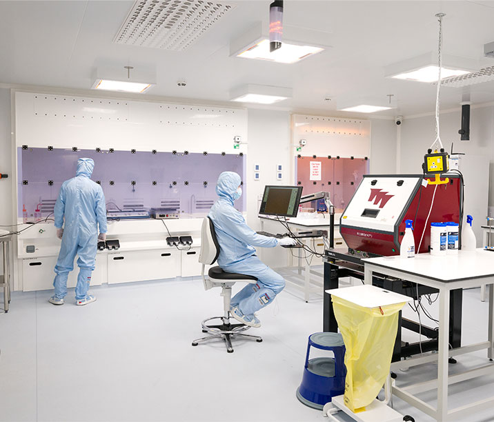 Two people working in the cleanroom