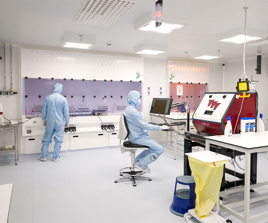 Two people working in the cleanroom