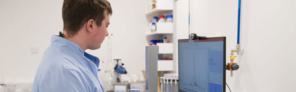 Technician working with NMR Spectrometer